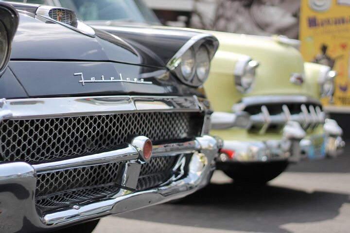 Our classic 1950s cars grace our courtyard...!